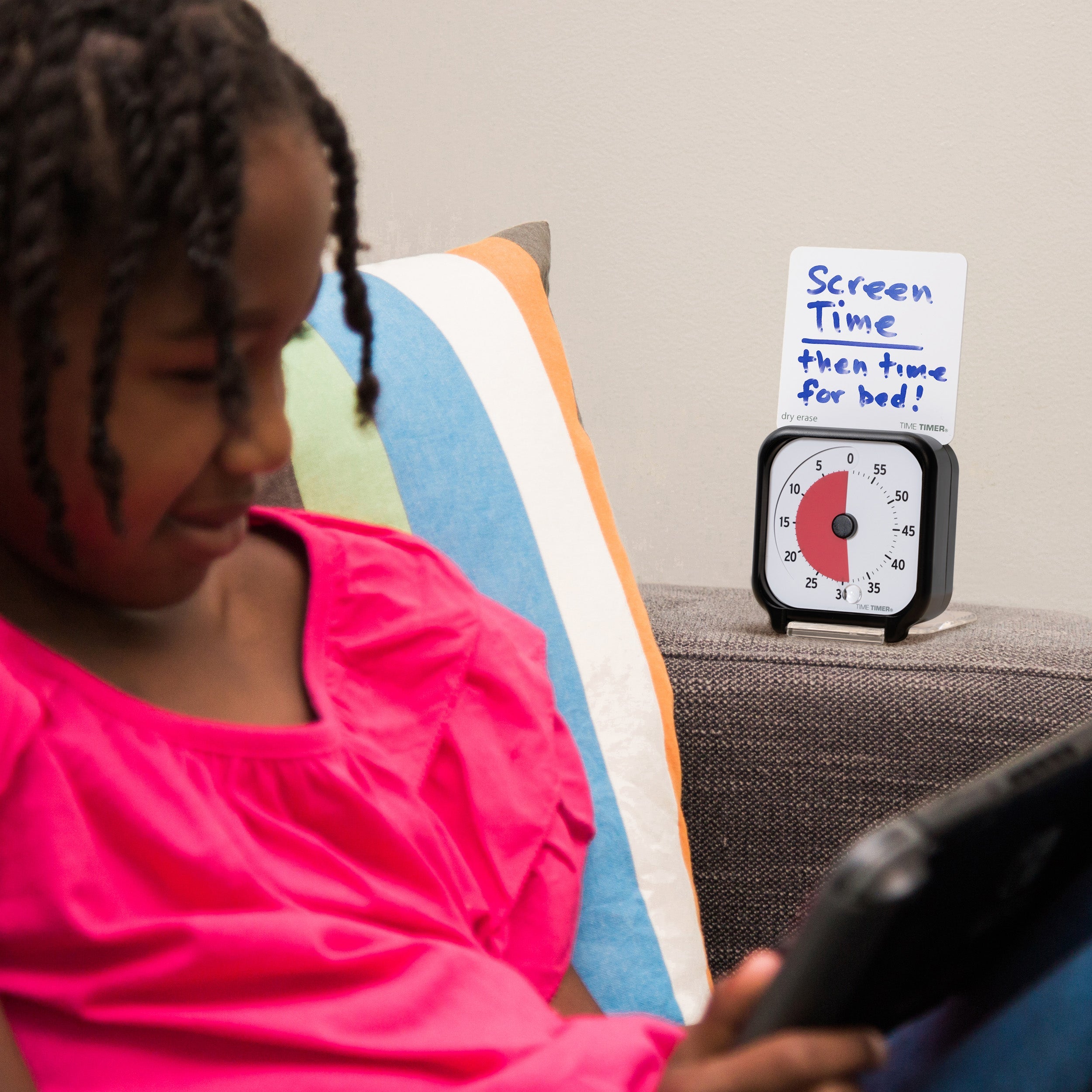 Time Timer Original 3 inch Visual Timer - Pocket. The Time Timer 3-inch is shown with a girl playing on a tablet or I-Pad. The Time Timer 3 inch is perfect for managing screentime for children. The included Dry Erase Activity Card can be used to document what the timer is being used for, and what activity will come next. 