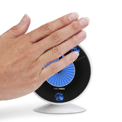 The Time Timer WASH visual handwashing timer is touchless. The timer starts with by simply holding ot slowly waving the hand in front of the device.